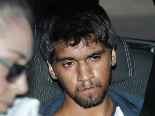 Mr Herrmann in custody is driven to the Victoria Police Centre for questioning. Picture: Alex Coppel.